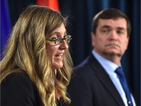 Jennifer Wood, chair of Agriculture Finance Services Corporation (AFSC) and Minister of Agriculture and Forestry, Oneil Carlier announcing a new board of directors for the AFSC, at the Legislature in Edmonton, Thursday, April 27, 2017.