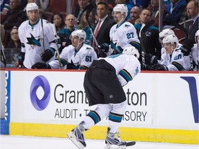 San Jose Sharks' Joe Thornton skates to the bench with an injury during the first period of an NHL hockey game against the Vancouver Canucks in Vancouver, B.C., on Sunday April 2, 2017.