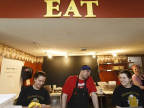 From left: Cat Hare, Owen Erskine, Allison Fifield and Samantha Berthelet work the counter on a busy Saturday at Mitchell's Cafe in Fort McMurray on Saturday, April 8, 2017.
