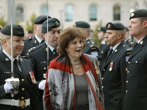 Lt.-Gov. Lois Mitchell inspects soldiers at the Vimy 100 Parade at the Alberta Legislature Plaza on Sunday, April 9, 2017, held to commemorate the 100th anniversary of the Battle of Vimy Ridge.