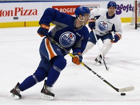 Edmonton Oilers captain Connor McDavid, left, and David Desharnais take part in a team practice at Rogers Place, in Edmonton on Monday April 3, 2017. (David Bloom)