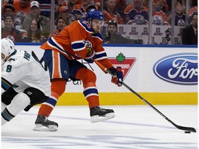 Edmonton Oilers forward Leon Draisaitl battles the San Jose Sharks' Joe Pavelski at Rogers Place in Edmonton on Thursday, April 20, 2017. (David Bloom)