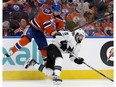 The Edmonton Oilers Patrick Maroon (19) battles the San Jose Sharks David Schlemko (5) during second period NHL playoff action at Roger Place, in Edmonton Thursday April 20, 2017. Photo by David Bloom For a Jonny Wakefield story running April 18, 2017.