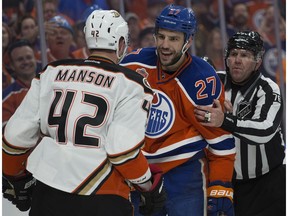 The Edmonton Oilers Milan Lucic (27) has words with the Anaheim Ducks Josh Manson (42) during first period NHL action at Rogers Place, in Edmonton Saturday April 30, 2017. Photo by David Bloom