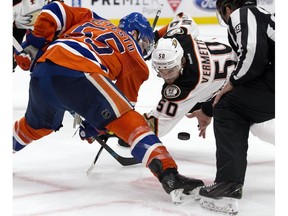 Edmonton Oilers Mark Letestu takes a face-off against the Anaheim Ducks' Antoine Vermette at Rogers Place in Edmonton on Saturday April 30, 2017. (David Bloom)