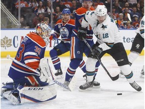 San Jose Sharks forward Patrick Marleau is stopped by Edmonton Oilers goalie Cam Talbot in Edmonton on March 30, 2017. (The Canadian Press)