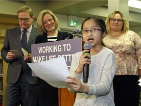 Eunique Situmorang, 10, thanks Alberta Education Minister David Eggen, left, Alberta Premier Rachel Notley and Alberta Health Minister Sarah Hoffman at Our Lady of Peace School in Edmonton on Wednesday April 5, 2017, where the provincial government announced that Alberta's nutrition program is being expanded to every school board in the 2017/2018 school year, thanks to an additional $10 million from Budget 2017.