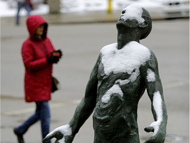 This statue at the UniversIty of Alberta campus was covered in snow as snowfall continued in the region on Tuesday April 18, 2017.