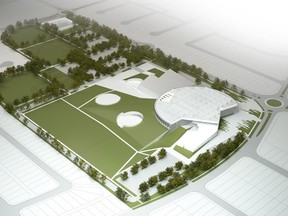 In this image the library and school are in the foreground. The round roof shows solar panels and the aquatic centre sits partway under the green roof with the round picnic area sunken in and facing south.