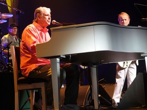Beach Boys founders Brian Wilson, at piano, and Al Jardine, right, performing at the Jube Wednesday night.