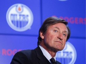 Wayne Gretzky answers questions after announcing his return to the Edmonton Oilers organization as a partner and vice chairman at Rogers Place in Edmonton on Oct. 12, 2016.