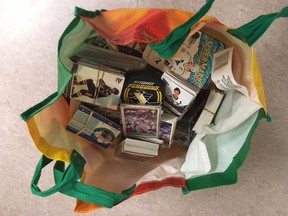 West division police recovered a stash of stolen property last year, including a collection of stamps and hockey cards in a green bag they hope to return to their rightful owner.
