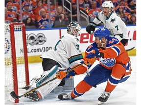 Zack Kassian of the Edmonton Oilers slides the puck wide of San Jose Sharks goalie Martin Jones's net at Rogers Place in Edmonton on April 14, 2017. (Shaughn Butts)