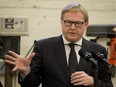 Education Minister David Eggen announces the results of a curriculum survey in a trades classroom at Westmount Junior High School, in Edmonton on April 13, 2017.