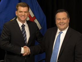 (left to right) Wildrose Party leader Brian Jean and Alberta PC leader Jason Kenney announce that they have reached a deal to merge the parties and create the United Conservative Party, during a press conference in Edmonton Thursday May 18, 2017.