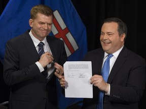 Wildrose Leader Brian Jean and Alberta PC Leader Jason Kenney announce that they have reached a deal to merge the parties and create the United Conservative Party, during a news conference in Edmonton on Thursday, May 18, 2017.