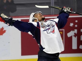 Windsor Spitfires left wing Jeremiah Addison (10) celebrates his third gaol of the game against the Erie Otters during third period Memorial Cup round robin hockey action in Windsor, Ont., on Wednesday, May 24, 2017. THE CANADIAN PRESS/Adrian Wyld