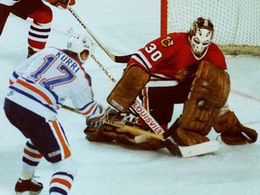 Edmonton Oilers forward Jari Kurri takes a shot on Chicago Black Hawks goalie Murray Bannerman on May 7, 1985, during Game 2 of the Campbell Conference final at Edmonton's Northlands Coliseum.