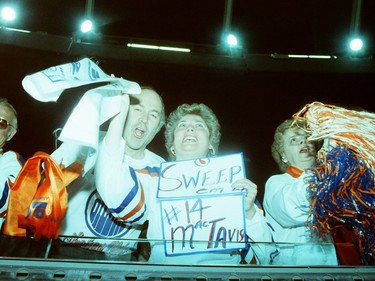 Fans at Northlands Coliseum cheer on May 26, 1988, during Game 4 of the Stanley Cup final between the host Edmonton Oilers and the Boston Bruins.