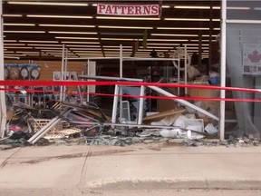 A Volkswagen Beetle crashed through the front window of a Fabricland Friday, May 12, 2017 in Edmonton.