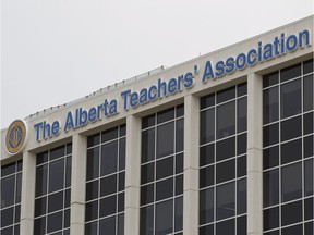 Professional misconduct charges laid against a teacher for "inappropriate text messages" with a student were actually a disagreement with her cleaning lady, an Edmonton teacher says.