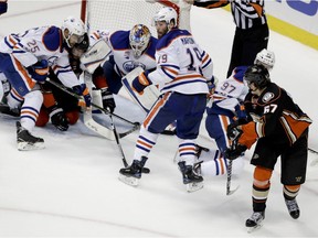 Anaheim Ducks center Rickard Rakell, right, scores during the third period in Game 5 of a second-round NHL hockey Stanley Cup playoff series against the Edmonton Oilers in Anaheim, Calif., Friday, May 5, 2017.
