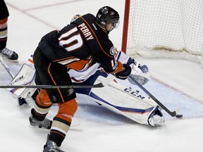 Anaheim Ducks right wing Corey Perry scores the game winning goal past Edmonton Oilers goalie Cam Talbot during the fifth period in overtime in Game 5 of a second-round NHL hockey Stanley Cup playoff series in Anaheim, Calif., Friday, May 5, 2017.