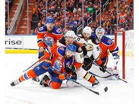 Edmonton Oilers defenceman Kris Russell (4) battle against Corey Perry (10) and Antoine Vermette (50) of the Anaheim Ducks in Game 6 of their Western Conference second round playoff series at Rogers Place on May 7, 2017, in Edmonton. (Getty Images)