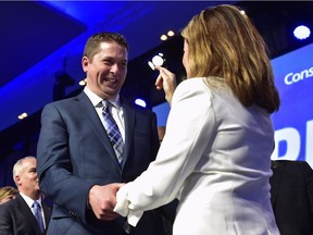 Andrew Scheer is congratulated by Rona Ambrose after being elected the new leader of the federal Conservative party at the federal Conservative leadership convention in Toronto on Saturday, May 27, 2017.