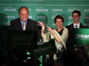 B.C. Green party leader Andrew Weaver is joined by Sonia Furstenau, (right) as he speaks to supporters at election headquarters at the Delta Ocean Pointe on election night in Victoria, B.C., on Wednesday, May 10, 2017.