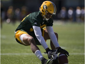 Arjen Colquhoun runs for the ball during a drill during the first day of training camp for the Eskimos on Sunday May 28, 2017, in Edmonton.