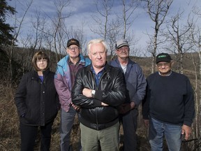 Bruce Tegart, centre, and neighbours, Arlene Heitzman, Norm Heitzman, Norman Ohrn and Wayne Sereda are pushing back against a proposed high-end gun range located 250 yards from Bruce's  home, proposed by Kloovenburg Sports Ltd.