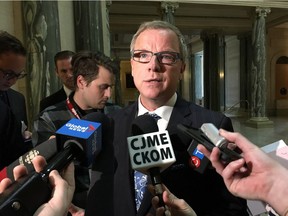 Saskatchewan Premier Brad Wall tells to reporters at the legislature in Regina, that his government will invoke the notwithstanding clause of the Charter of Rights and Freedoms so it can keep Catholic school funding for non-Catholic students.