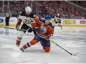 Connor McDavid (97) of the Edmonton Oilers, manages to stave off Ryan Kesler of the Anaheim Ducks in Game 4 of the NHL second round playoffs at Rogers Place in Edmonton on May 3,  2017.