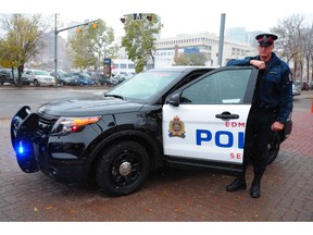 Edmonton Police Service Cst. Scott Anthony with the Ford Police Interceptor Utility (Explorer) in Edmonton, October 10, 2012. The service is six years into the new generation of police vehicles after Ford retired the Crown Victoria. In that time, the SUVs have grown to almost 90 per cent of the EPS's patrol fleet.