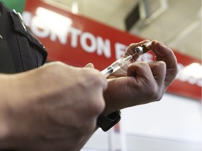 Edmonton Fire Rescue Services training officer Clint Snider demonstrates how a naloxone kit works. Naloxone was used twice in Slave Lake this week to revive people who had overdosed.