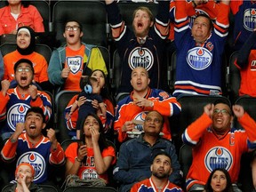 Edmonton Oilers fans watch their team play the Anaheim Ducks on the big screen at Rogers Place in Edmonton on Wednesday May 10, 2017. They were playing game seven of their Stanley Cup playoff series in Anaheim, California.