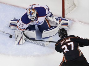 Edmonton Oilers goalie Cam Talbot, left, blocks a shot by Anaheim Ducks left wing Nick Ritchie during the second period in Game 7 of a second-round NHL hockey Stanley Cup playoff series in Anaheim, Calif., Wednesday, May 10, 2017.