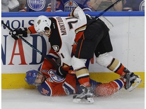 Edmonton Oilers forward Jordan Eberle is checked by Anaheim Ducks' Brandon Montour in the fourth game of their second-round playoff series in Edmonton on Wednesday, May 3, 2017. (Larry Wong)