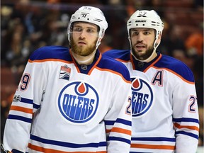 Leon Draisaitl #29 of the Edmonton Oilers and Milan Lucic #27 talk in the final minutes of the third period against the Anaheim Ducks during Game 5 of their playoff series on May 5, 2017.