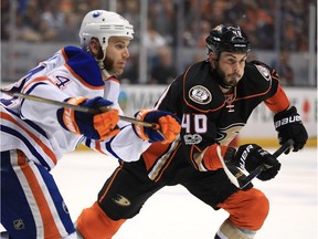 Jared Boll #40 of the Anaheim Ducks skates against Kris Russell #4 of the Edmonton Oilers in Game 7 of the Western Conference Second Round during the 2017 NHL Stanley Cup Playoffs at Honda Center on May 10, 2017 in Anaheim, California.