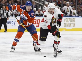 Edmonton's Ryan Nugent-Hopkins (93) chases Ottawa's Cody Ceci (5) during the first period of a NHL game between the Edmonton Oilers and the Ottawa Senators at Rogers Place on Sunday, October 30, 2016.