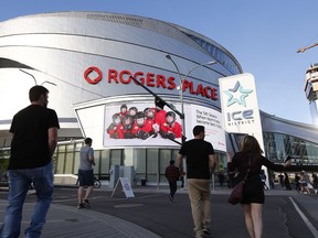 Fans walk to the Red Hot Chili Peppers concert on Sunday night, May 28, 2017, at Rogers Place, where the Oilers Entertainment Group constantly adjusts its security measures, said spokesperson Tim Shipton.
