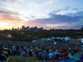 The sun sets over the main stage during the Edmonton Folk Music Festival at Gallagher Park in Edmonton, Alta. on Sunday, Aug. 9, 2015.