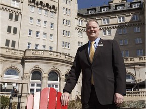 Garrett Turta, general manager of the Fairmont Hotel Macdonald, poses for a photo on the patio in Edmonton, Alta. on Thursday, May 11, 2017. He said the hotel has seen some bright spots but continues to feel the pinch from the oil and gas downturn.