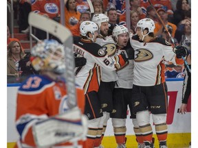 Goalie Cam Talbot (33) of the Edmonton Oilers, looks away from Ryan Getzlaf of the Anaheim Ducks celebrating his second goal of the game in Game 4 of the NHL second round playoffs at Rogers Place in Edmonton on May 3,  2017. Photo by Shaughn Butts / Postmedia