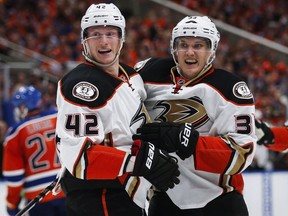 Anaheim Ducks' Jakob Silfverberg, right, celebrates his goal with teammate Josh Manson during third period NHL hockey round two playoff action against the Edmonton Oilers on April 30, 2017.