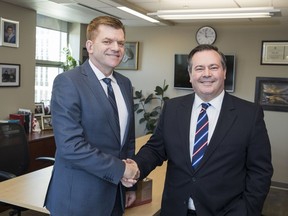 Wildrose Leader Brian Jean meets with newly elected PC Leader Jason Kenney as they announce plans for new discussion groups for conservative unity on Monday, March 20, 2017.Photo by CHRIS BOLIN / Wildrose HANDOUT PHOTO