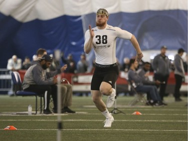 Waterloo defensive back Jordan Hoover runs the 40-yard dash during the 2017 Ontario Regional Combine for the  CFL at Varsity Stadium in Toronto on March 17, 2017.