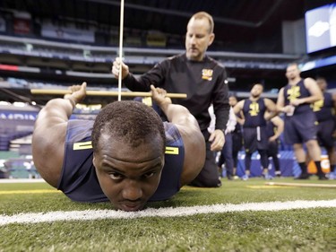 Mississippi State offensive lineman Justin Senior is measured for flexibility at the NFL football scouting combine on March 3, 2017, in Indianapolis.